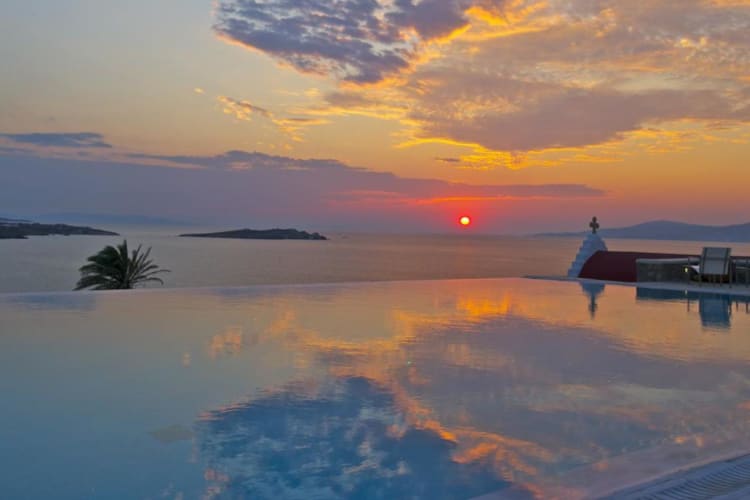 infinity pool and sunset